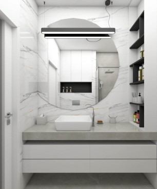 Mała łazienka z białą szafką wiszącą
