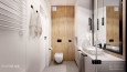 Aranżacja łazienki z drewnianą jedną ścianą