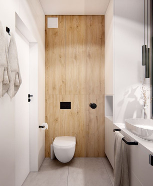 Aranżacja łazienki z drewnianą jedną ścianą