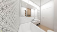 Łazienka z białymi dużymi płytkami na ścianie