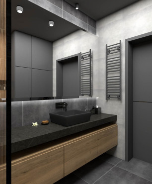 Aranżacja łazienki z czarno-drewnianymi płytkami