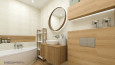 Łazienka z białą wanną narożną oraz z okrągłym lustrem w drewnianej ramie