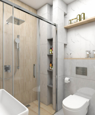 Łazienka z szarymi, dużymi płytkami na podłodze oraz imitacją drewnianych płytek pod prysznicem