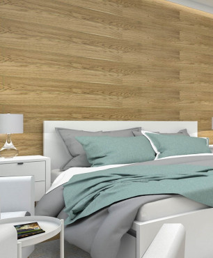 Sypialnia z drewnianą ścianą z łóżkiem kontynentalnym