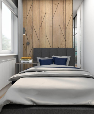 Wąska sypialnia z drewnianą ścianą ze wzorem w romby
