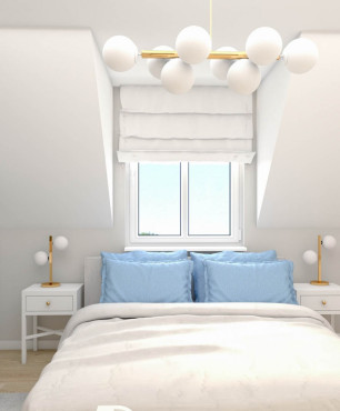 Sypialnia ze skosami sufitowymi w kolorze białym