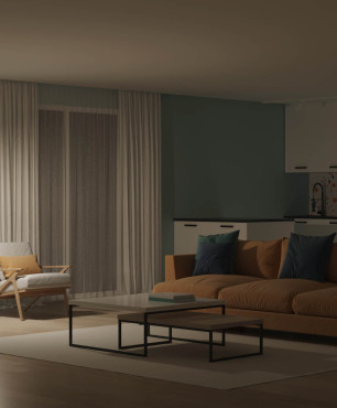 Salon z dużą sofą w kolorze miodowym