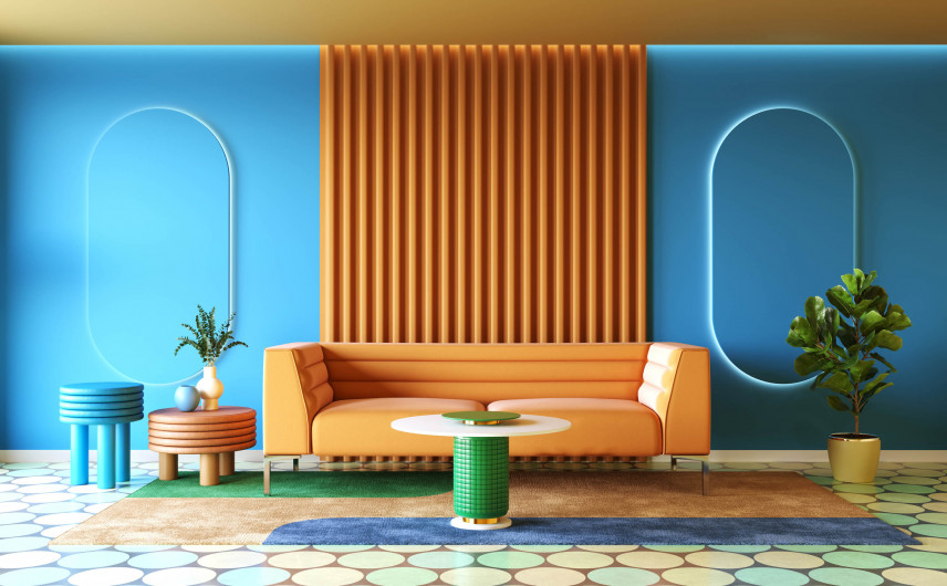 Salon w stylu Memphis z designerską, pomarańczową sofą
