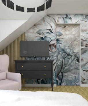 Sypialnia na poddaszu z fotelem w kolorze pudrowego różu