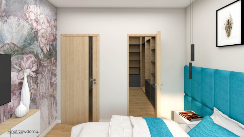 Sypialnia z turkusowymi panelami tapicerowanymi na ścianie oraz z garderobą