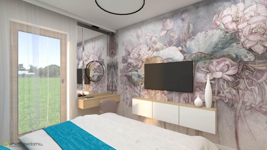 Nowoczesna sypialnia z tapetą w kwiaty na ścianie oraz z toaletką z drewnianym blatem