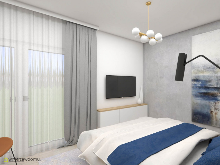 Sypialnia z tynkiem dekoracyjnym na ścianie i z lampą wiszącą
