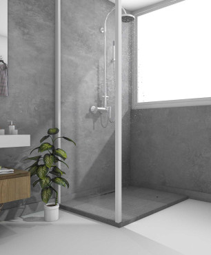 Łazienka z betonową ścianą i prysznicem