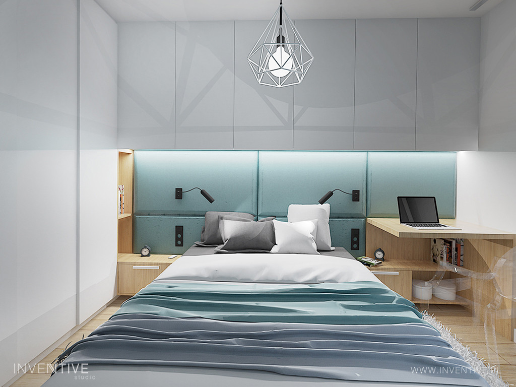 Sypialnia z turkusowymi panelami tapicerowanymi nad łóżkiem kontynentalnym