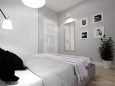 Sypialnia z prostokątnym lustrem