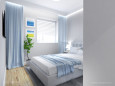 Sypialnia z niebieskimi zasłonami
