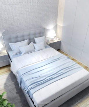 Nowoczesna sypialnia z łóżkiem kontynentalnym i białą trzydrzwiową szafą