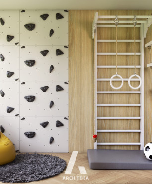 Ścianka wspinaczkowa i drabinka gimnastyczna w pokoju dziecięcym
