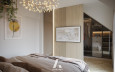 Sypialnia z drewnianym lamelem na ścianie