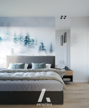 Sypialnia z tapetą z motywem lasu na ścianie