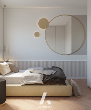 Funkcjonalna sypialnia z dużym, okrągłym lustrem
