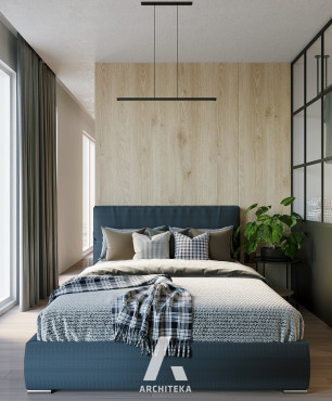 Mała sypialnia z drewnianą ścianą za łóżkiem kontynentalnym
