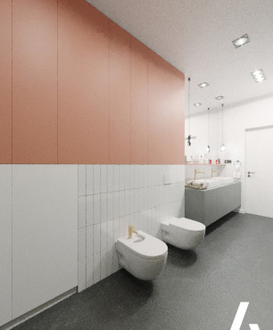Łazienka z szarą podłogą i ścianą w kolorze pastelowego czerwonego