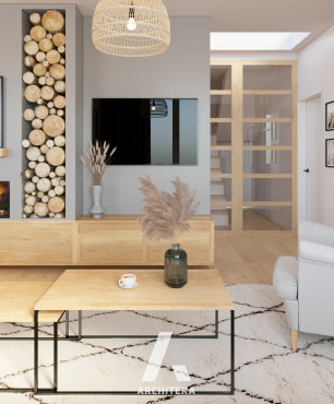 Salon z narożnym kominkiem oraz z miejscem na drewno w ścianie