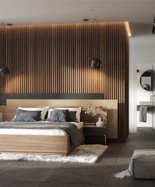 Duża sypialnia z drewnem na ścianie oraz dużym łóżkiem kontynentalnym