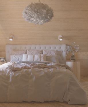Klimatyczna sypialnia w drewnianym domku