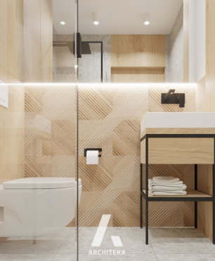 Łazienka z imitacją drewnianych płytek z wzorem 3d na ścianie