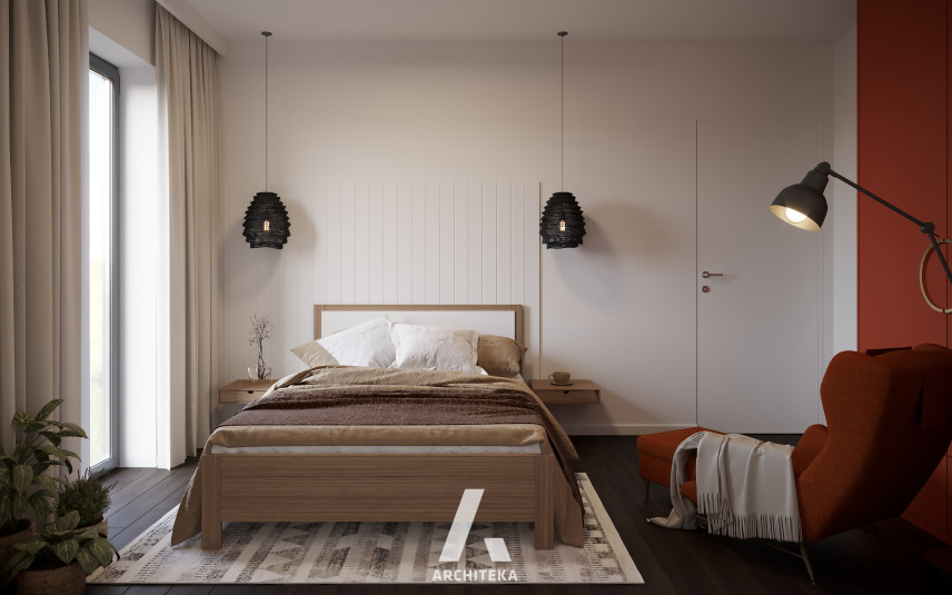 Sypialnia z bordową ścianą i łóżkiem kontynentalnym