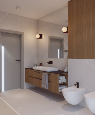 Łazienka z dużymi białymi kaflami na podłodze i na ścianie oraz z drewnianą szafką pod białym zlewem