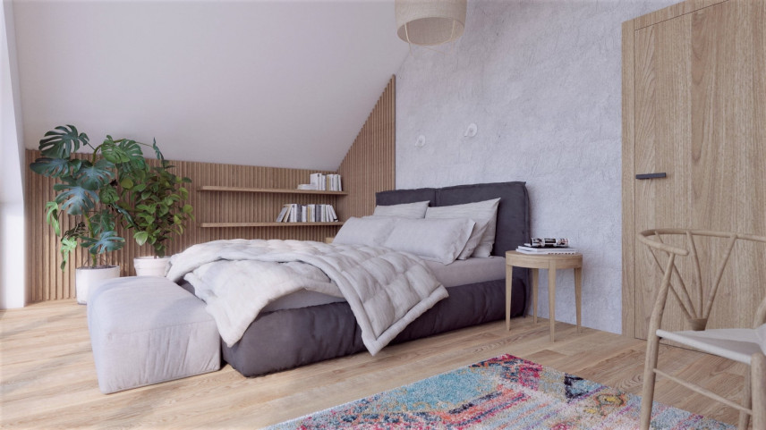 Sypialnia z szarym łóżkiem kontynentalnym oraz z drewnianą boazerią na ścianie