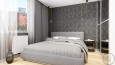 Sypialnia z wzorzystą tapetą na ścianie