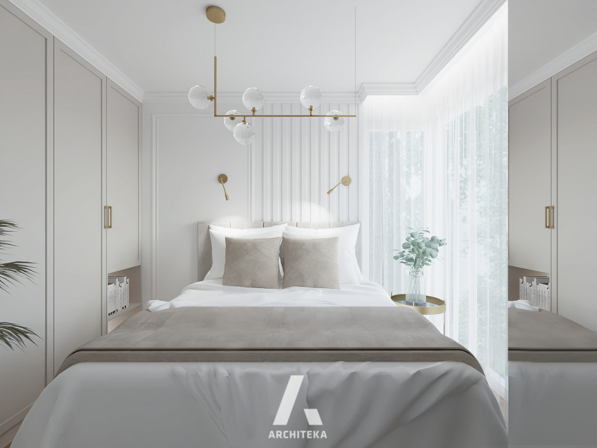 Sypialnia w stylu klasycznym z modną lampą wiszącą