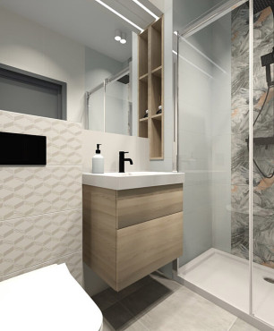 Łazienka z prostokątnym prysznicem oraz z płytkami na ścianie firmy Paradyż
