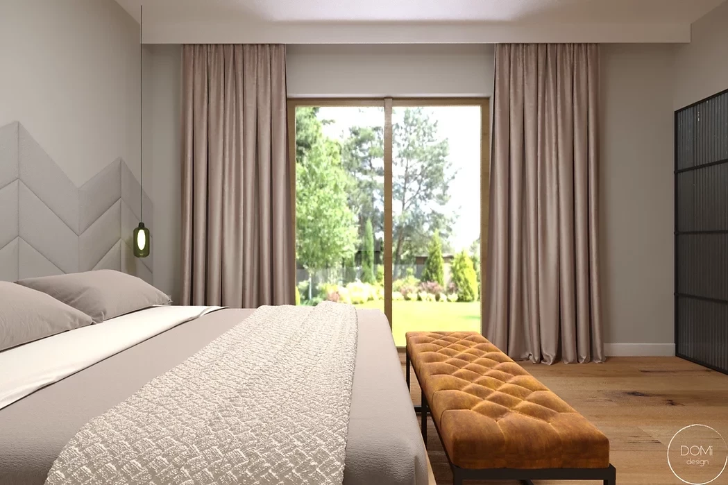 Sypialnia z szarymi, tapicerowanymi panelami na ścianie
