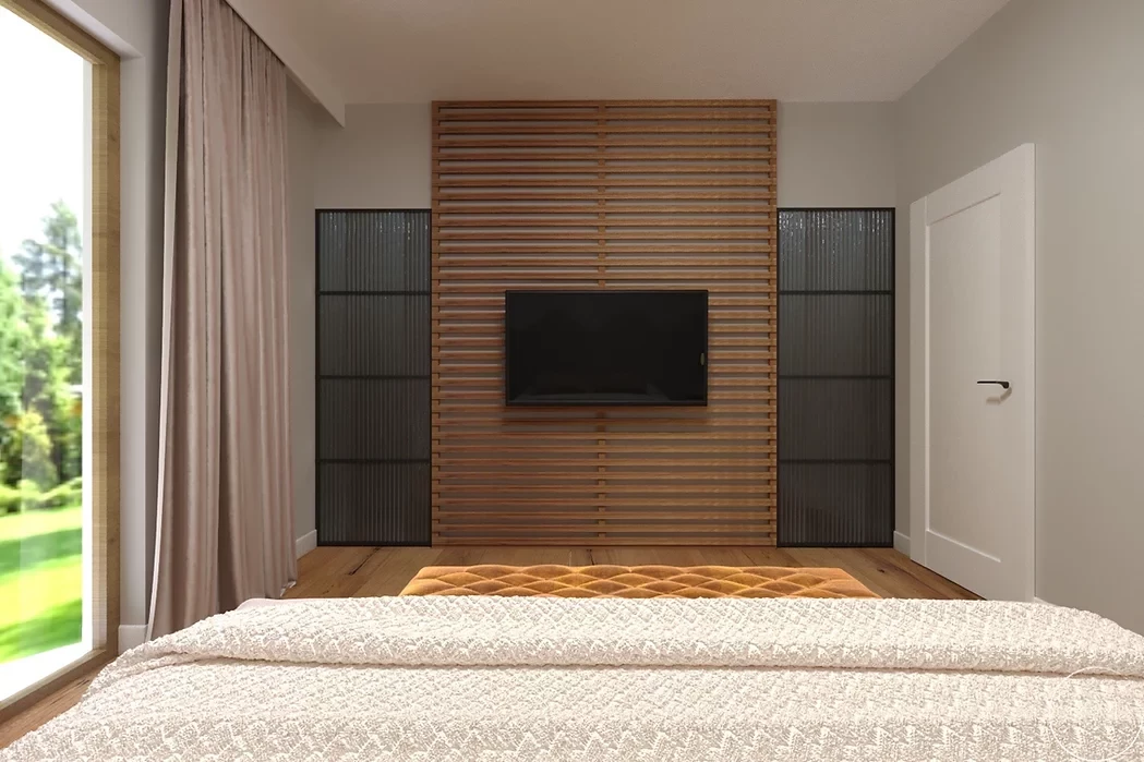 Sypialnia z telewizorem na drewnianej ścianie