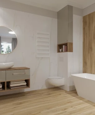 Łazienka z białymi płytkami gresowymi na ścianie oraz lustrem