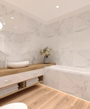 Klasyczna łazienka z białymi gresowymi płytkami na ścianie oraz prostokątną wanną w zabudowie