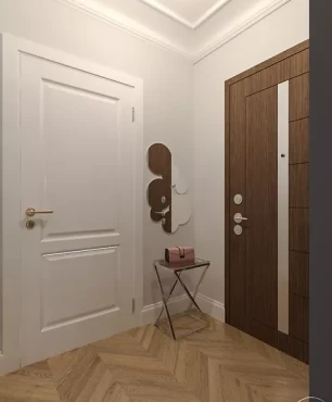 Wejście do mieszkania z frontem drzwi w kolorze orzechowym