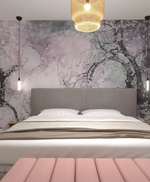 Projekt sypialni z tapetą na ścianie oraz ażurową lampą wiszącą