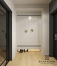 Projekt przedpokoju z białą szafą w połysku z drzwiami uchylnymi