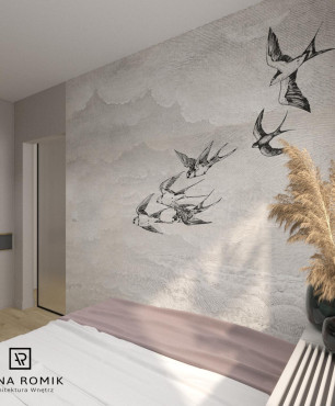 Sypialnia z tapetą w jaskółki na ścianie