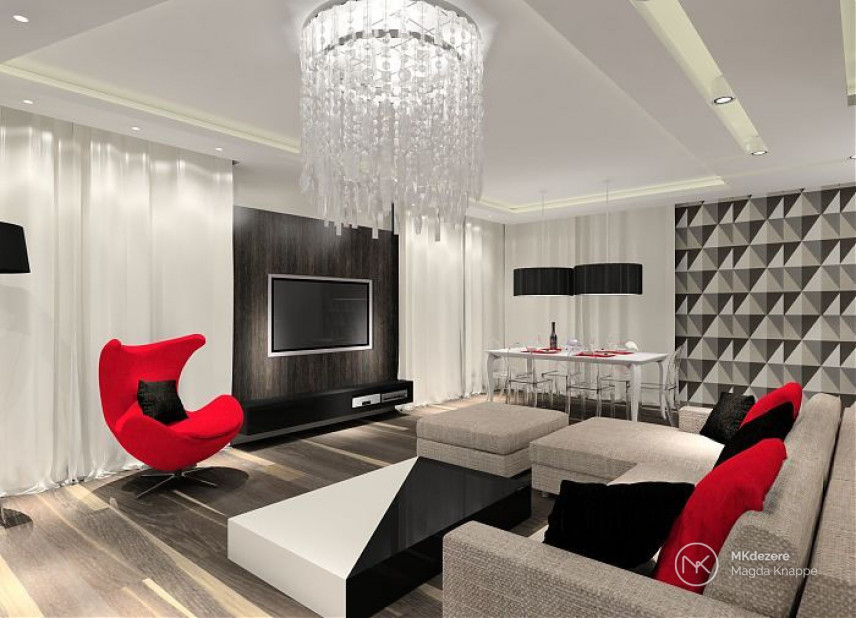 Salon w stylu nowoczesnym z biało-czarnym stolikiem kawowym oraz czerwonym fotelem obracanym