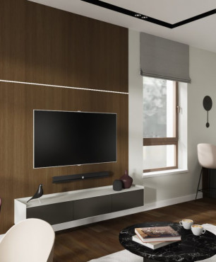 Salon z drewnem na ścianie i telewizorem