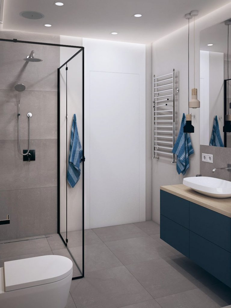 Projekt łazienki z szarymi płytkami na podłodze i ścianie oraz z prysznicem