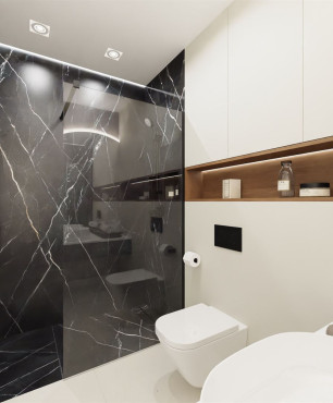 Projekt łazienki z czarnymi gresowymi płytkami z białą żyłką pod prysznicem