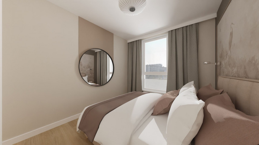 Sypialnia z okrągłym lustrem w czarnej ramie oraz z łóżkiem kontynentalnym
